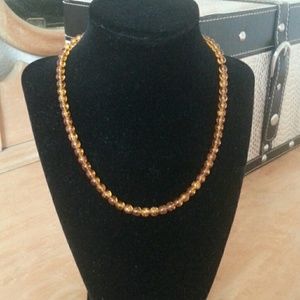 2/$10 amber colored glass bead necklace